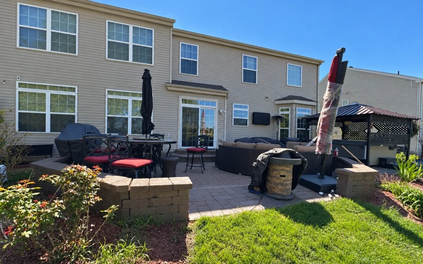 Original paver patio before the Trex deck installation in Bolingbrook, IL