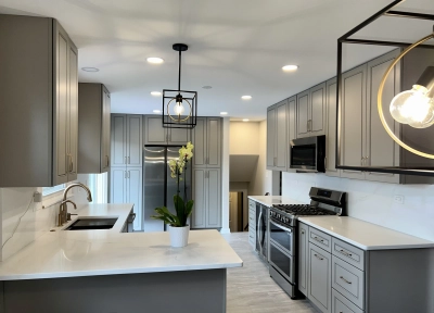 A complete kitchen remodel in Naperville with custom cabinetry, stylish lighting, and durable flooring, creating a seamless bala