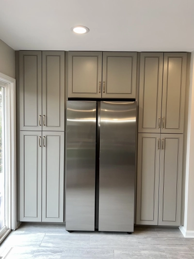 This kitchen renovation highlights state-of-the-art appliances, sleek cabinetry, and premium finishes for a perfect mix of style