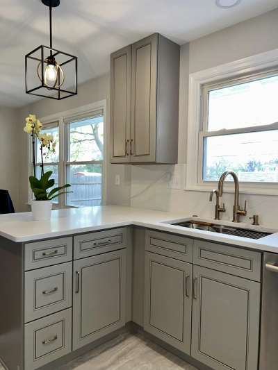 A beautifully redesigned kitchen remodel in Naperville, featuring custom cabinetry, quartz countertops, and expert kitchen remod