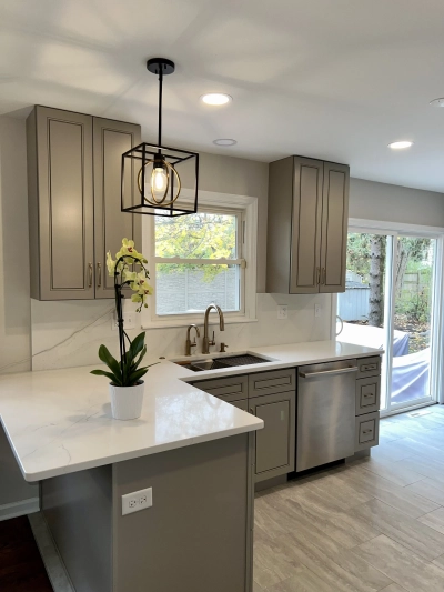 This kitchen renovation maximizes space with a smart layout, stylish cabinetry, and seamless integration of remodeling services 