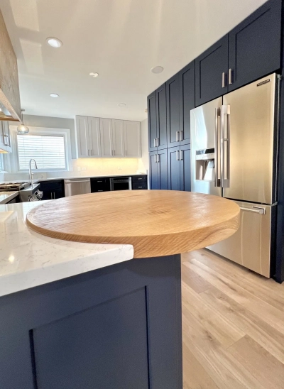 White quarts countertop with butcher block bistro table top