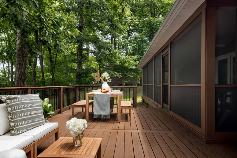Custom wood composite deck with dining area and screened porch addition in St. Charles IL