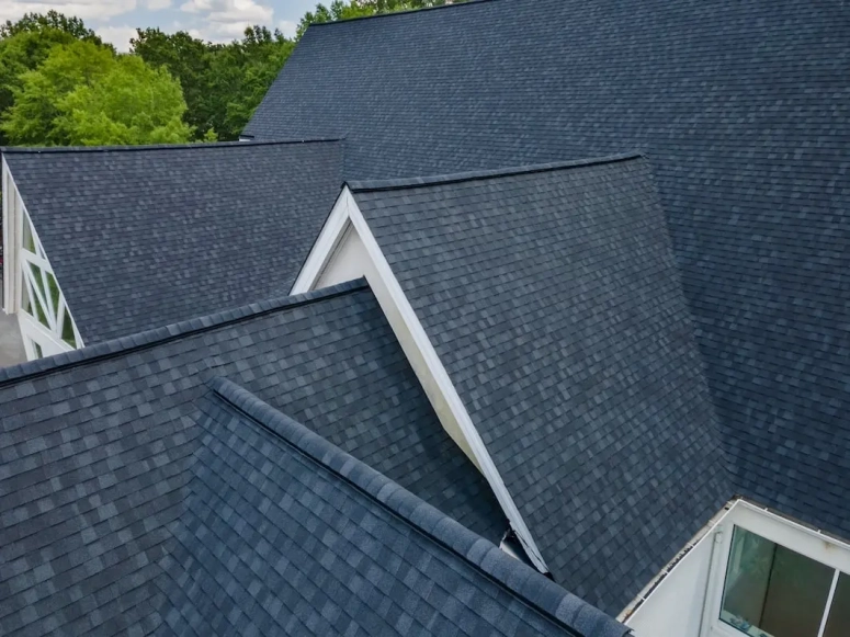 Close-up of dark architectural shingle roof replacement in Lombard IL installed by Naperville Roofing and Construction