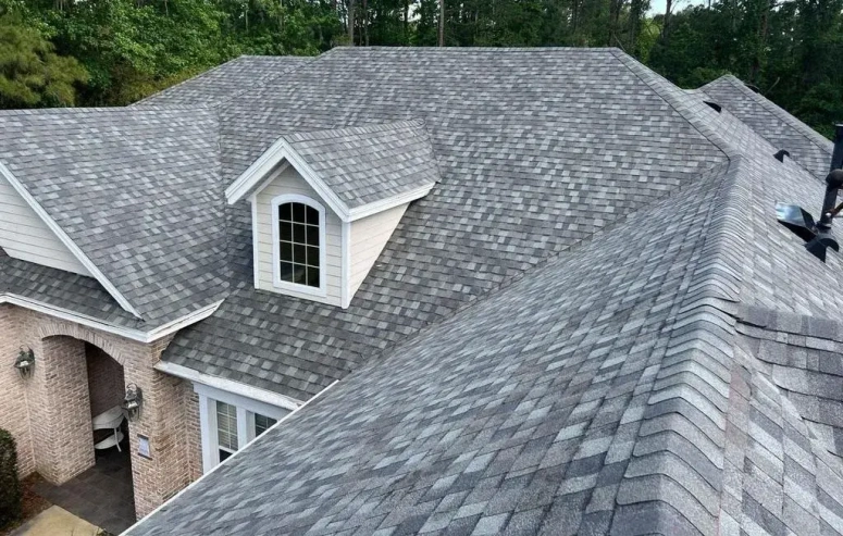Asphalt shingle roof installation on residential home by roofing contractor in Plainfield IL