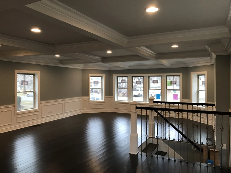 Unique Ceiling + Dark Wood Flooring